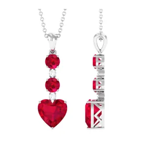 Created Ruby and Moissanite Heart Dangle Pendant Necklace